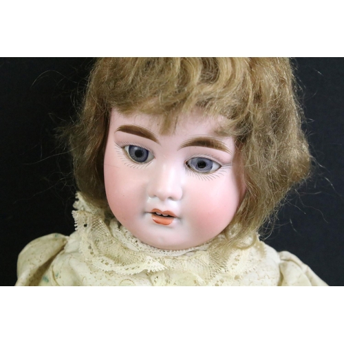 287 - Four early 20th C Armand Marseille bisque headed dolls with glass eyes, jointed composition limbs, p... 