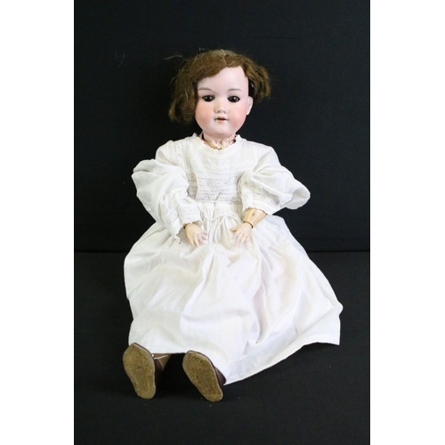 287 - Four early 20th C Armand Marseille bisque headed dolls with glass eyes, jointed composition limbs, p... 