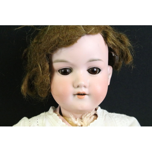 287 - Four early 20th C Armand Marseille bisque headed dolls with glass eyes, jointed composition limbs, p... 