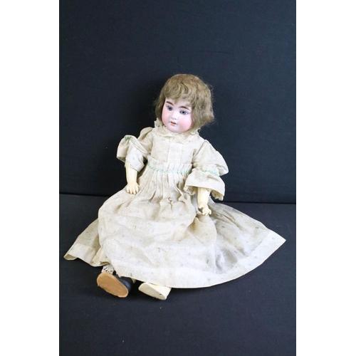 287 - Four early 20th C Armand Marseille bisque headed dolls with glass eyes, jointed composition limbs, p... 