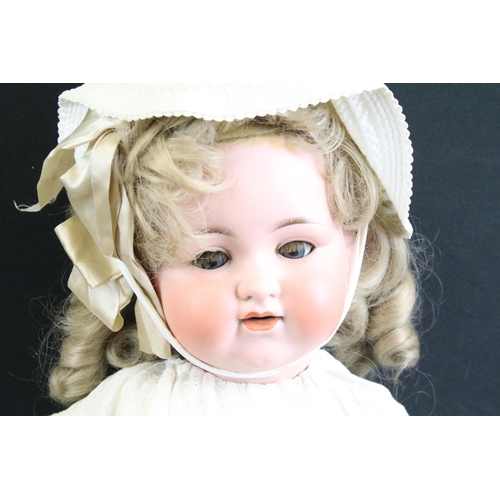 293 - Two large early 20th C Armand Marseille bisque headed dolls with glass sleeping eyes, jointed compos... 