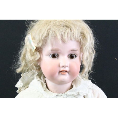 293 - Two large early 20th C Armand Marseille bisque headed dolls with glass sleeping eyes, jointed compos... 