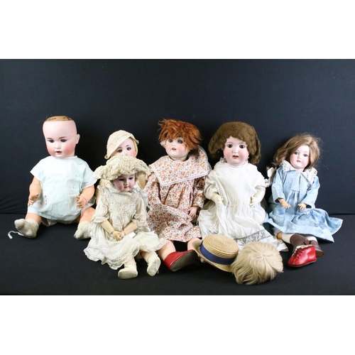 294 - Six early 20th century German bisque headed dolls with glass eyes, composition limbs and painted fac... 