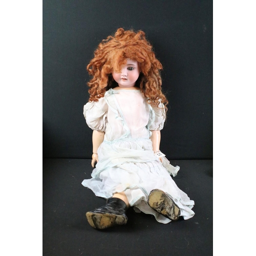 299 - Group of dolls to include 2 x early 20th century Schoenau & Hoffmeister bisque headed dolls with com... 