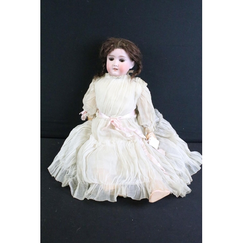 299 - Group of dolls to include 2 x early 20th century Schoenau & Hoffmeister bisque headed dolls with com... 