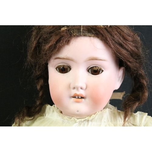 299 - Group of dolls to include 2 x early 20th century Schoenau & Hoffmeister bisque headed dolls with com... 