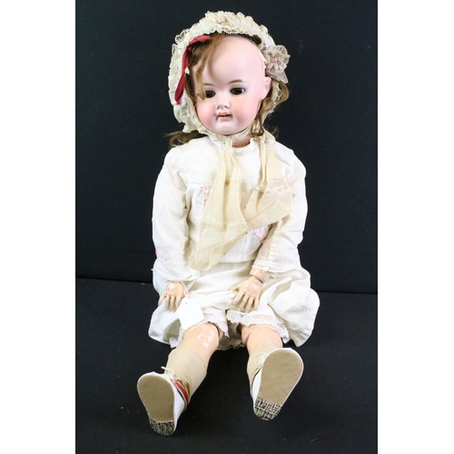 299 - Group of dolls to include 2 x early 20th century Schoenau & Hoffmeister bisque headed dolls with com... 