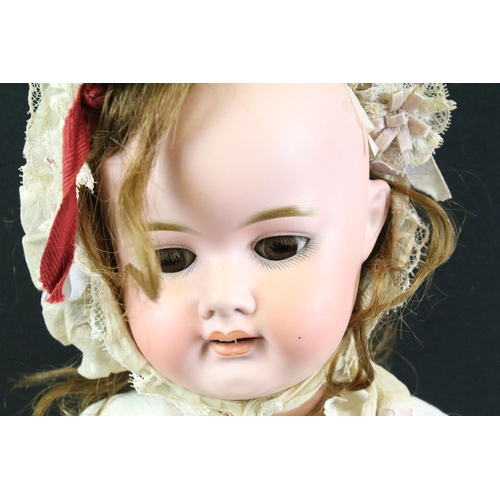 299 - Group of dolls to include 2 x early 20th century Schoenau & Hoffmeister bisque headed dolls with com... 