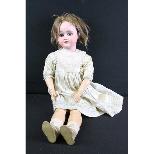 299 - Group of dolls to include 2 x early 20th century Schoenau & Hoffmeister bisque headed dolls with com... 