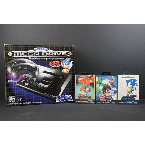 380 - Retro gaming - Boxed Sega Mega Drive console with controller plus 3 x boxed games featuring Sonic, S... 