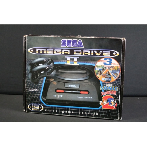 366 - Retro Gaming - A boxed Sega Mega Drive II 16-Bit games console with two controllers, manual, power s... 