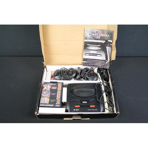 366 - Retro Gaming - A boxed Sega Mega Drive II 16-Bit games console with two controllers, manual, power s... 