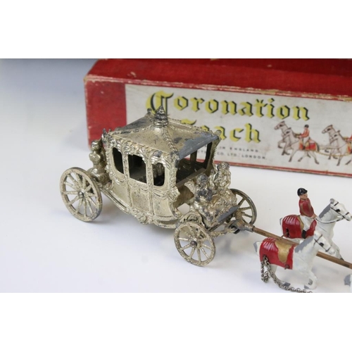 290 - Boxed Lesney Coronation Coach diecast model  (paint wear and tatty box) and a John Hill windmill wit... 