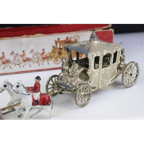 290 - Boxed Lesney Coronation Coach diecast model  (paint wear and tatty box) and a John Hill windmill wit... 