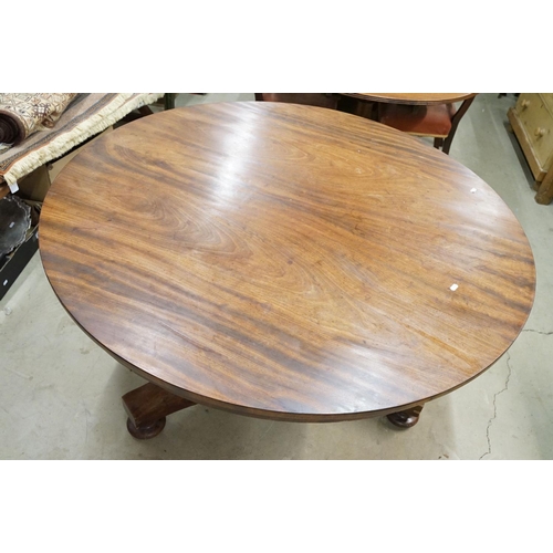 635 - 19th century Flamed Mahogany Circular Tilt Top Breakfast Table raised on a plain turned pillar suppo... 