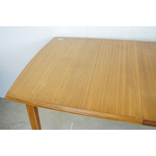 657 - Mid century Retro Vanson Teak extending Dining Room Table raised on square tapering legs, label to u... 