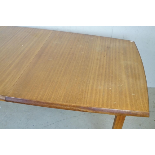 657 - Mid century Retro Vanson Teak extending Dining Room Table raised on square tapering legs, label to u... 