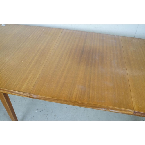 657 - Mid century Retro Vanson Teak extending Dining Room Table raised on square tapering legs, label to u... 