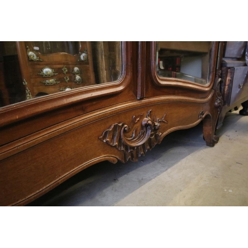 672 - Large 19th century French Walnut Linen Cupboard, the two mirrored doors opening to four adjustable s... 