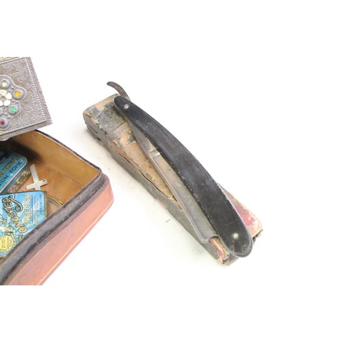 229 - Antique leather box with contents including two cased cheroot holders, lorgnettes, Gramophone needle... 