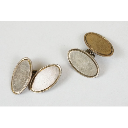 257 - A collection of gents cufflinks to include hallmarked gold and hallmarked silver examples.