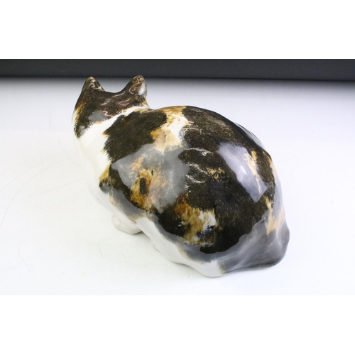 12 - Winstanley Pottery seated tabby cat, size 5, with glass eyes, signed to base, approx 16cm high