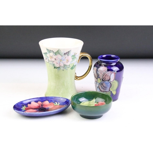 13 - Group of Moorcroft pottery, 4 pieces, to include a hand painted floral mug of waisted form ('M. Crab... 