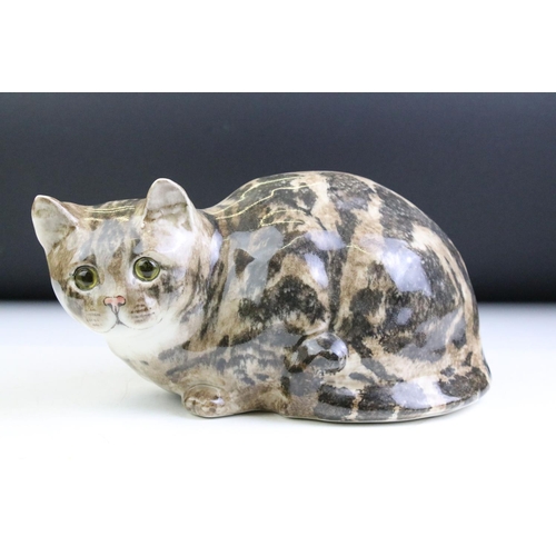 15 - Winstanley Pottery seated tabby cat, size 5, with glass eyes, signed to base, approx 14cm high