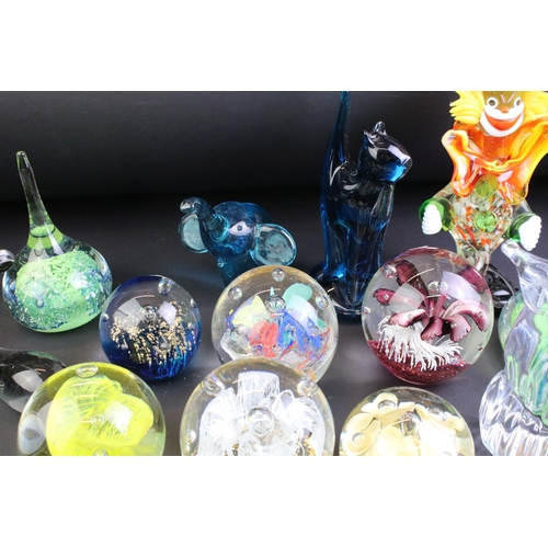 59 - Collection of 20th century glass paperweights and ornaments, featuring a Murano clown (21cm tall), S... 