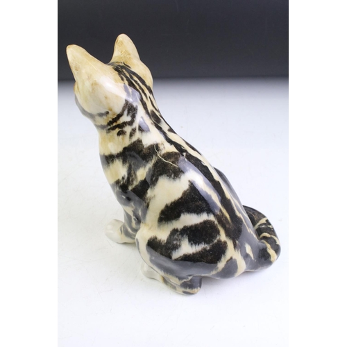 66 - Two Winstanley Pottery seated tabby cat figures, size 3 and 4, with glass eyes, signed to bases, tal... 