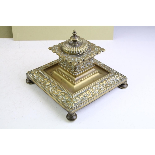 350 - Mixed collectables to include a Victorian cast brass desk inkwell (15.5cm wide), brass casket, yello... 