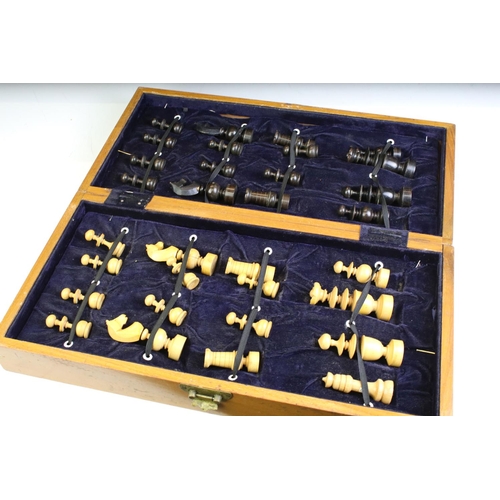 352 - Wooden chess set with boxwood & ebonised pieces, with folding board, measures approx 43cm wide