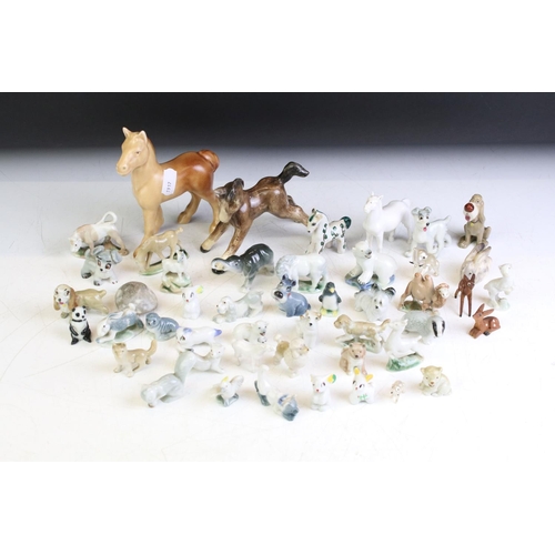 72 - Collection of around 30 small ceramic animal figures, featuring Wade & Tosca of Italy