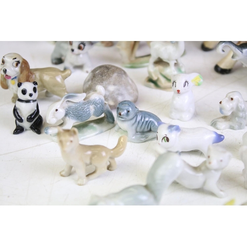 72 - Collection of around 30 small ceramic animal figures, featuring Wade & Tosca of Italy