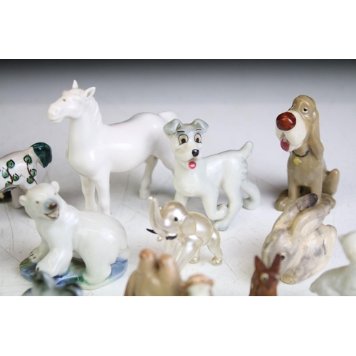 72 - Collection of around 30 small ceramic animal figures, featuring Wade & Tosca of Italy