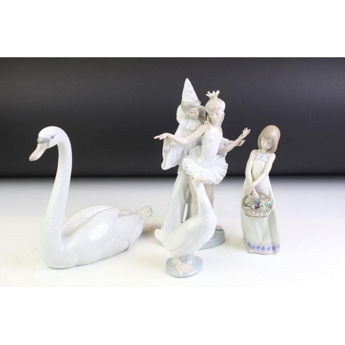 73 - Three Lladro porcelain figures to include 4882 Carnival Couple (26cm high), 5065 floral Treasures & ... 