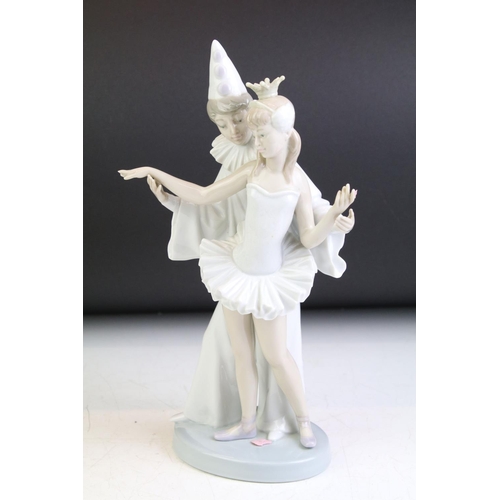 73 - Three Lladro porcelain figures to include 4882 Carnival Couple (26cm high), 5065 floral Treasures & ... 