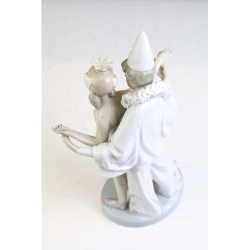 73 - Three Lladro porcelain figures to include 4882 Carnival Couple (26cm high), 5065 floral Treasures & ... 