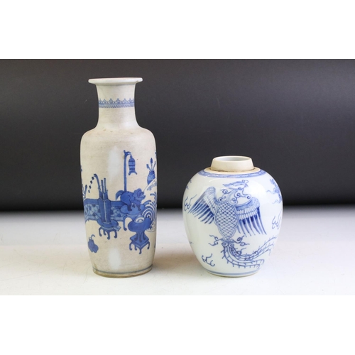 74 - Chinese blue & white baluster vase decorated with a scene with mythical lion, tables & flowers in va... 