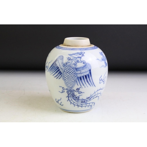 74 - Chinese blue & white baluster vase decorated with a scene with mythical lion, tables & flowers in va... 