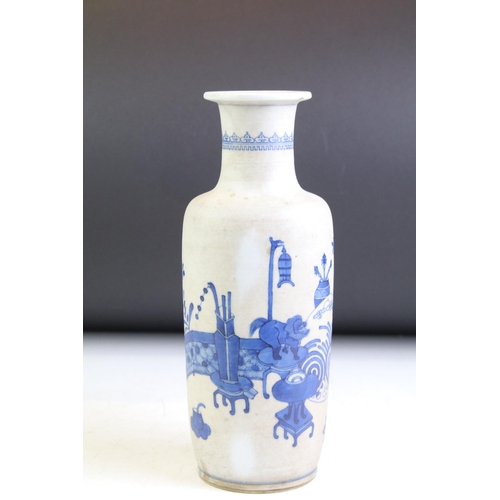 74 - Chinese blue & white baluster vase decorated with a scene with mythical lion, tables & flowers in va... 