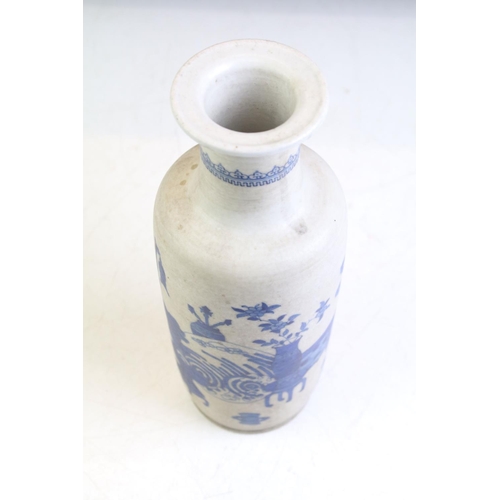 74 - Chinese blue & white baluster vase decorated with a scene with mythical lion, tables & flowers in va... 