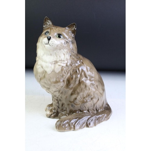 79 - Ceramic animals to include Royal Doulton Chow Chow (boxed), Beswick cat, Beswick owl and a Royal Dou... 