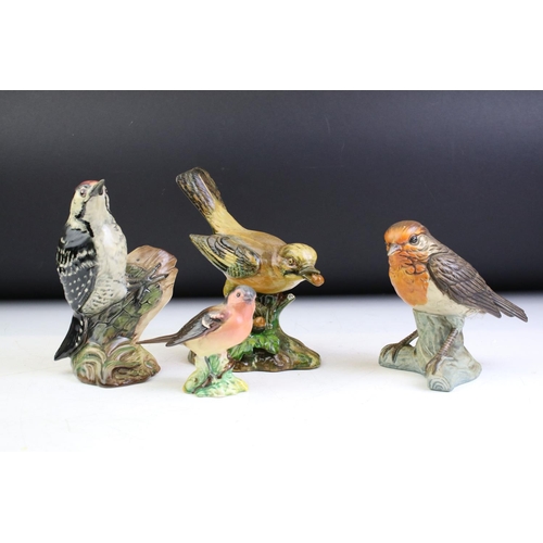 81 - Beswick lesser Spotted Woodpecker, ceramic Jay marked A M Cooper, bisque robin figuirne and small bi... 