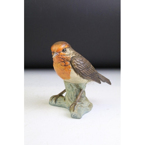 81 - Beswick lesser Spotted Woodpecker, ceramic Jay marked A M Cooper, bisque robin figuirne and small bi... 