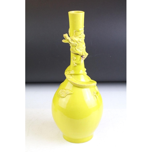 85 - Chinese famille jaune dragon bottle vase with raised detailing (a/f) together with a hexagonal vase ... 