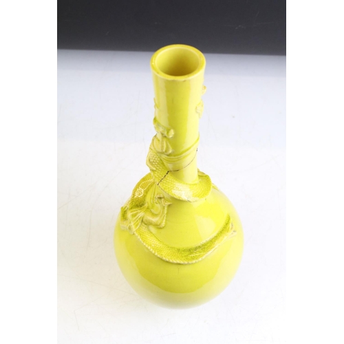 85 - Chinese famille jaune dragon bottle vase with raised detailing (a/f) together with a hexagonal vase ... 