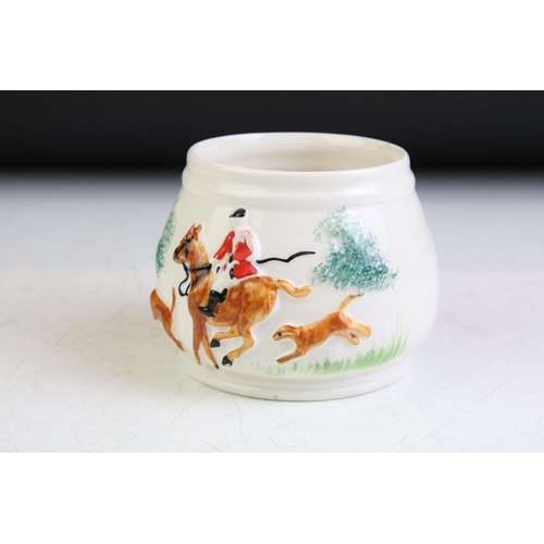 93 - PPC Hunting Scene porcelain tea ware with moulded decoration, to include teapot, water jug and 2 x m... 