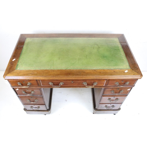 595 - Victorian Mahogany Twin Pedestal Desk with green leather inset top and an arrangement of nine drawer... 