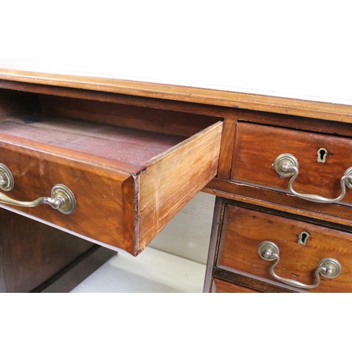 595 - Victorian Mahogany Twin Pedestal Desk with green leather inset top and an arrangement of nine drawer... 